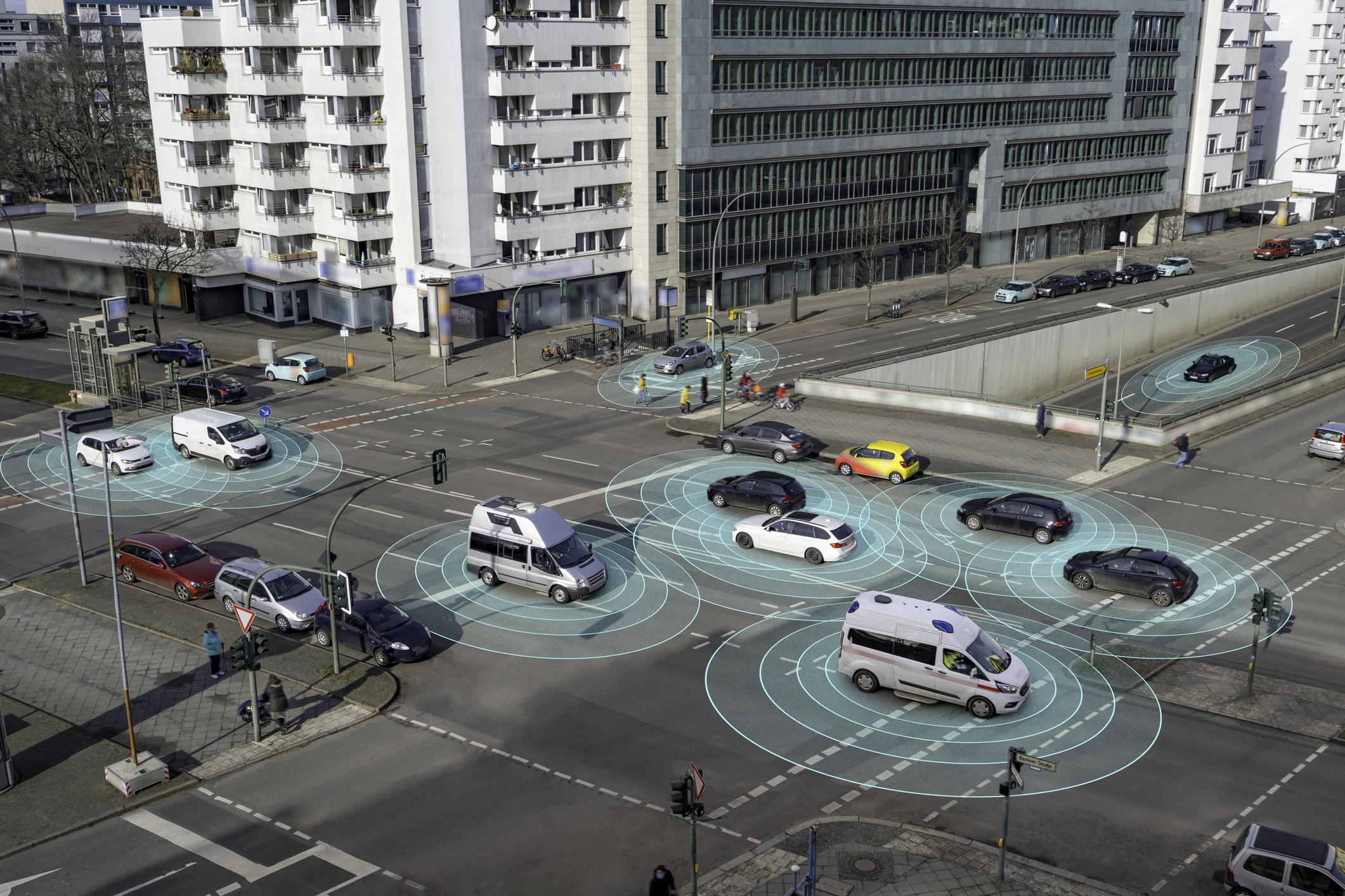 cars driving at busy city intersection with real time monitoring